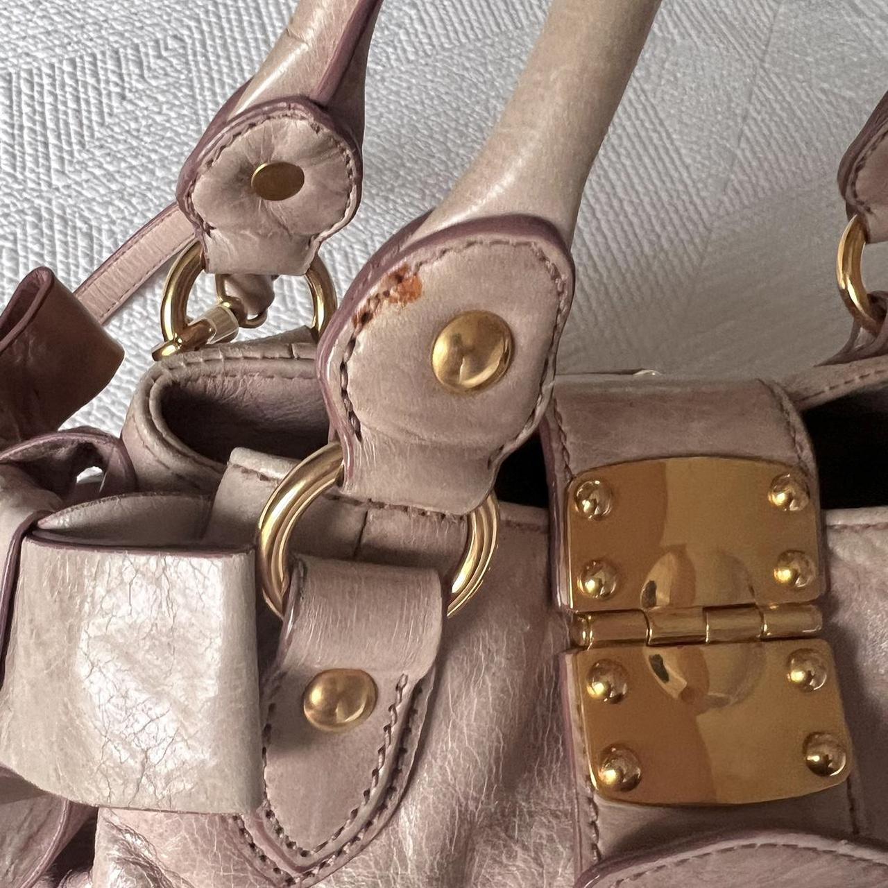 Authentic Light Pink Miu Miu Vitello Leather Bow Bag With Gold Hardware And Removable Strap