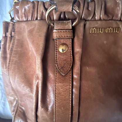 Authentic Brown Miu Miu Vitello Leather Bag With Gold Hardware And Removable Strap